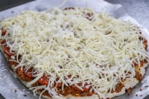 Homemade Pizza with Tomato and Pesto Ricotta Sauce